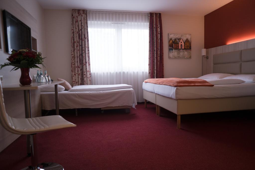 Hotel Roedelheimer Hof - Am Wasserturm Frankfurt nad Mohanem Pokoj fotografie