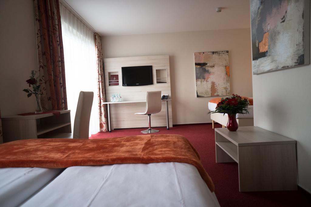 Hotel Roedelheimer Hof - Am Wasserturm Frankfurt nad Mohanem Pokoj fotografie