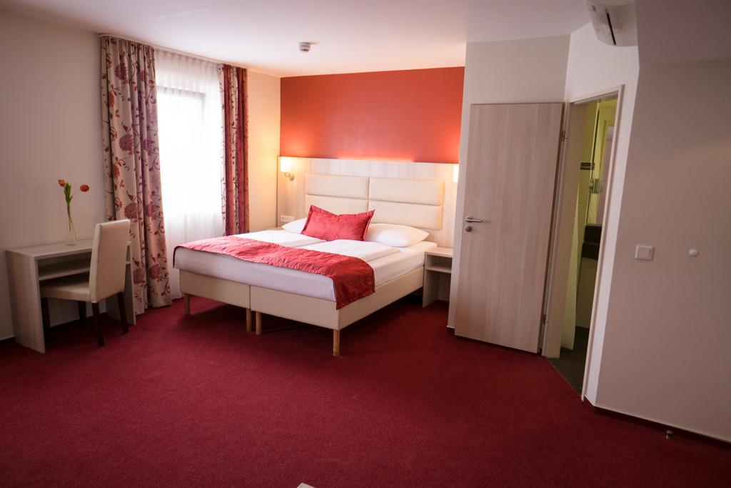 Hotel Roedelheimer Hof - Am Wasserturm Frankfurt nad Mohanem Pokoj fotografie