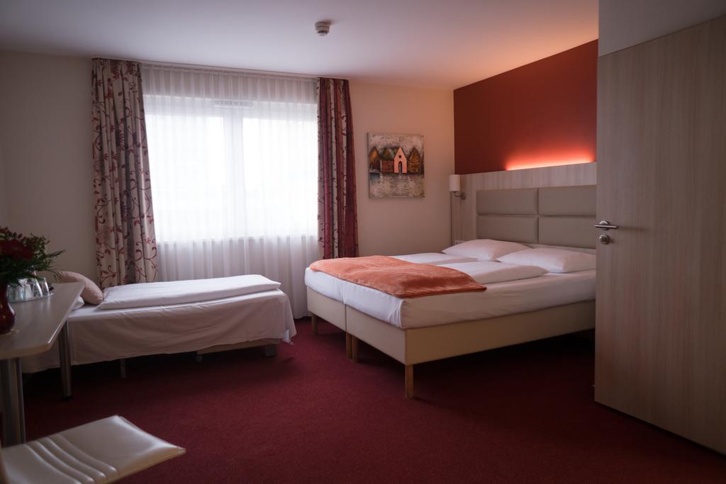 Hotel Roedelheimer Hof - Am Wasserturm Frankfurt nad Mohanem Pokoj fotografie